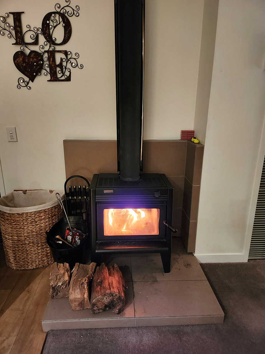 ultimate stays queenstown getaway lounge fire view